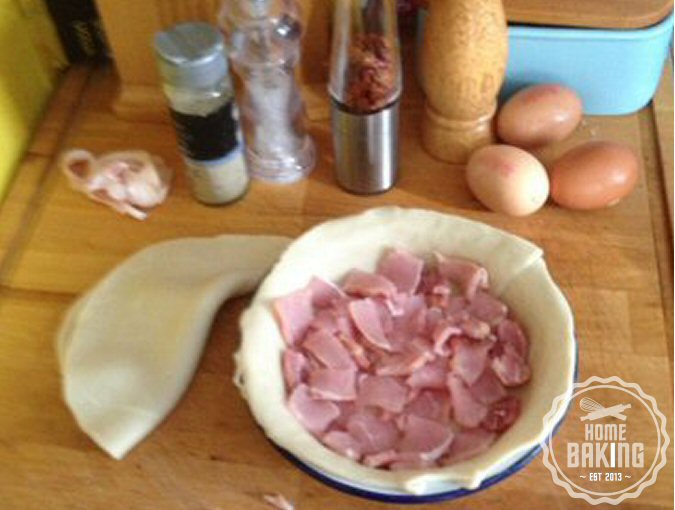 place cut bacon into the lined pie dish