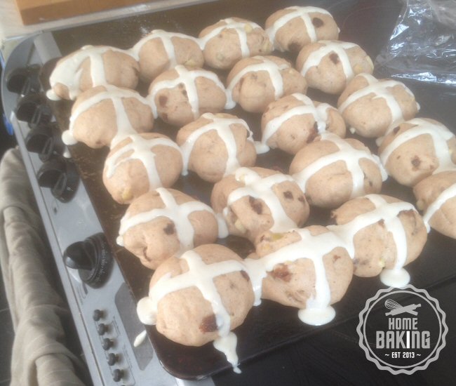 putting the cross on the hot cross buns