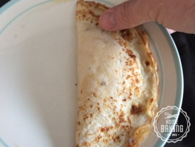 Seal the edges of the pancake by pressing it together